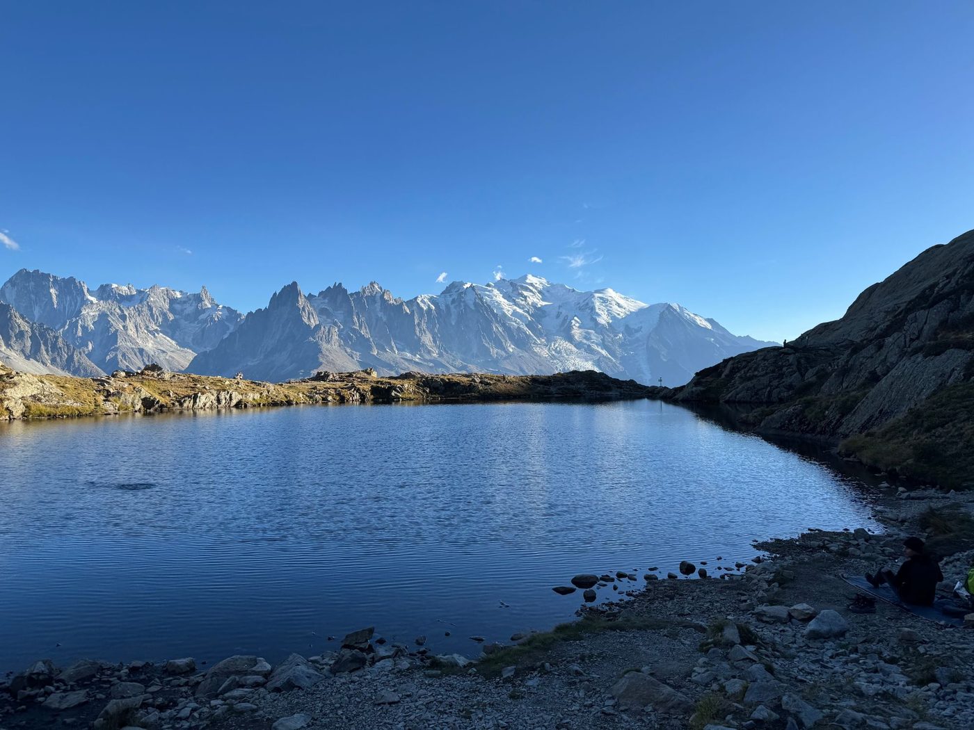 A still alpine lake below Mont Blanc